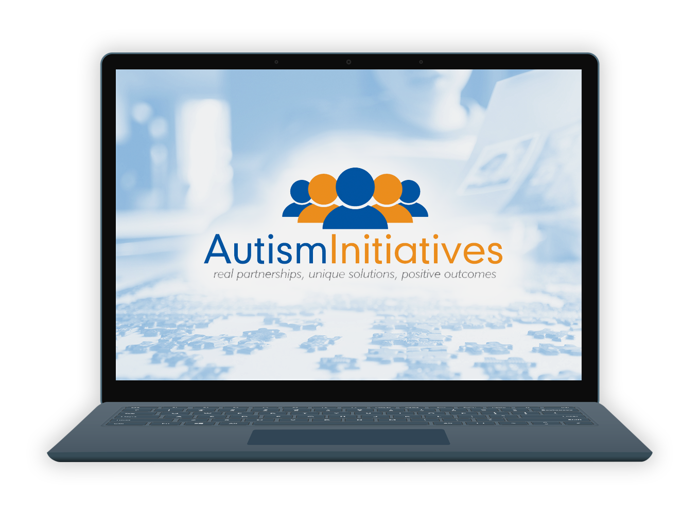 EiB Autism Initiatives Page - Laptop with Autism Initiatives logo